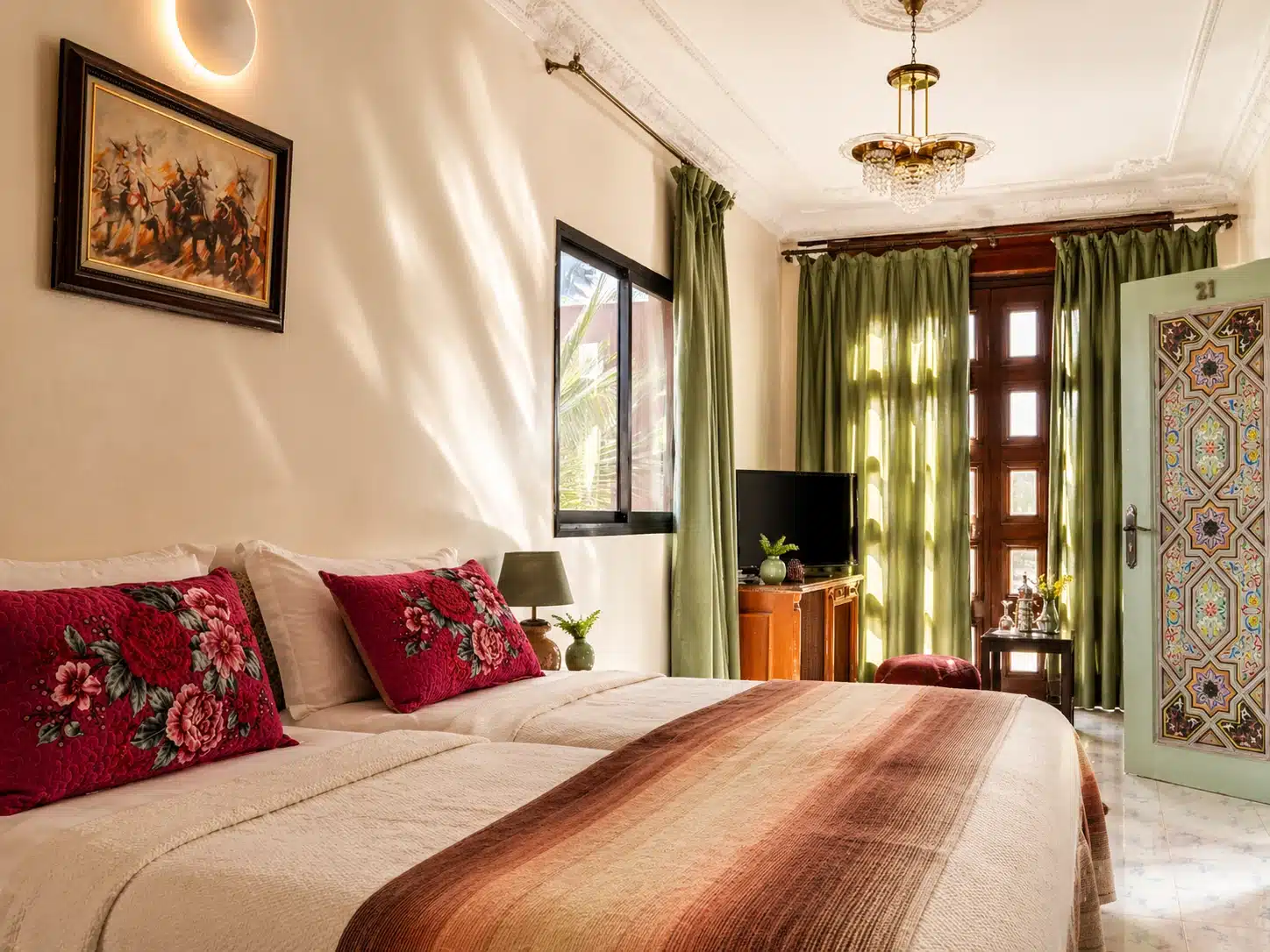 Bright Moroccan-inspired bedroom at Riad Qodwa