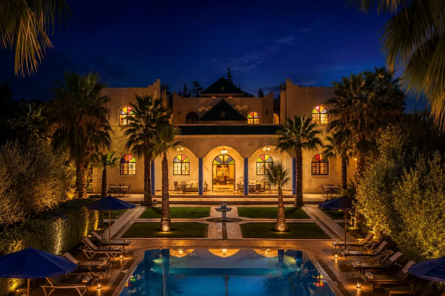 Riad Qodwa façade at night in Marrakech